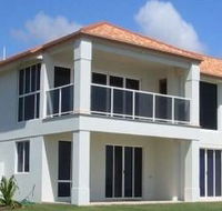 Bargara Beach Oceanfront Holiday Home - eAccommodation