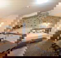 Highlander Motor Inn and Apartments - eAccommodation