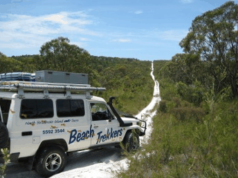 Beach trekkers North Stradbroke Island - eAccommodation