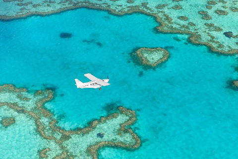 Scenic Flight - Great Barrier Reef, Heart Reef, Whitehaven Beach & Hill Inlet! - eAccommodation 1