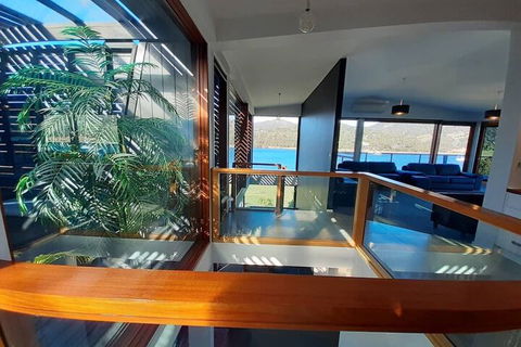 Amazing Unique Five-Star Waterfront Retreat - eAccommodation 2