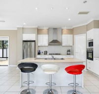 Central Gold Coast Large Modern Elevated Home - eAccommodation