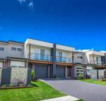 Escape at Nobbys Executive Townhouse 1 74 Pacific Drive - eAccommodation