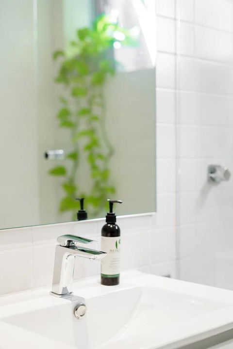 Waterfront Apartment Brimming With Inspirational Artwork - eAccommodation 24