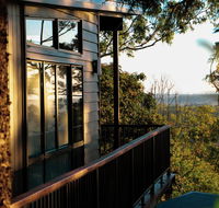 Rainforest Gardens - Luxury Hillside Chalets with Views to Bay  Islands - eAccommodation