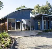 Corrugated Cottage - eAccommodation