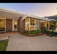 Woorim Secluded Palms Cottage - eAccommodation